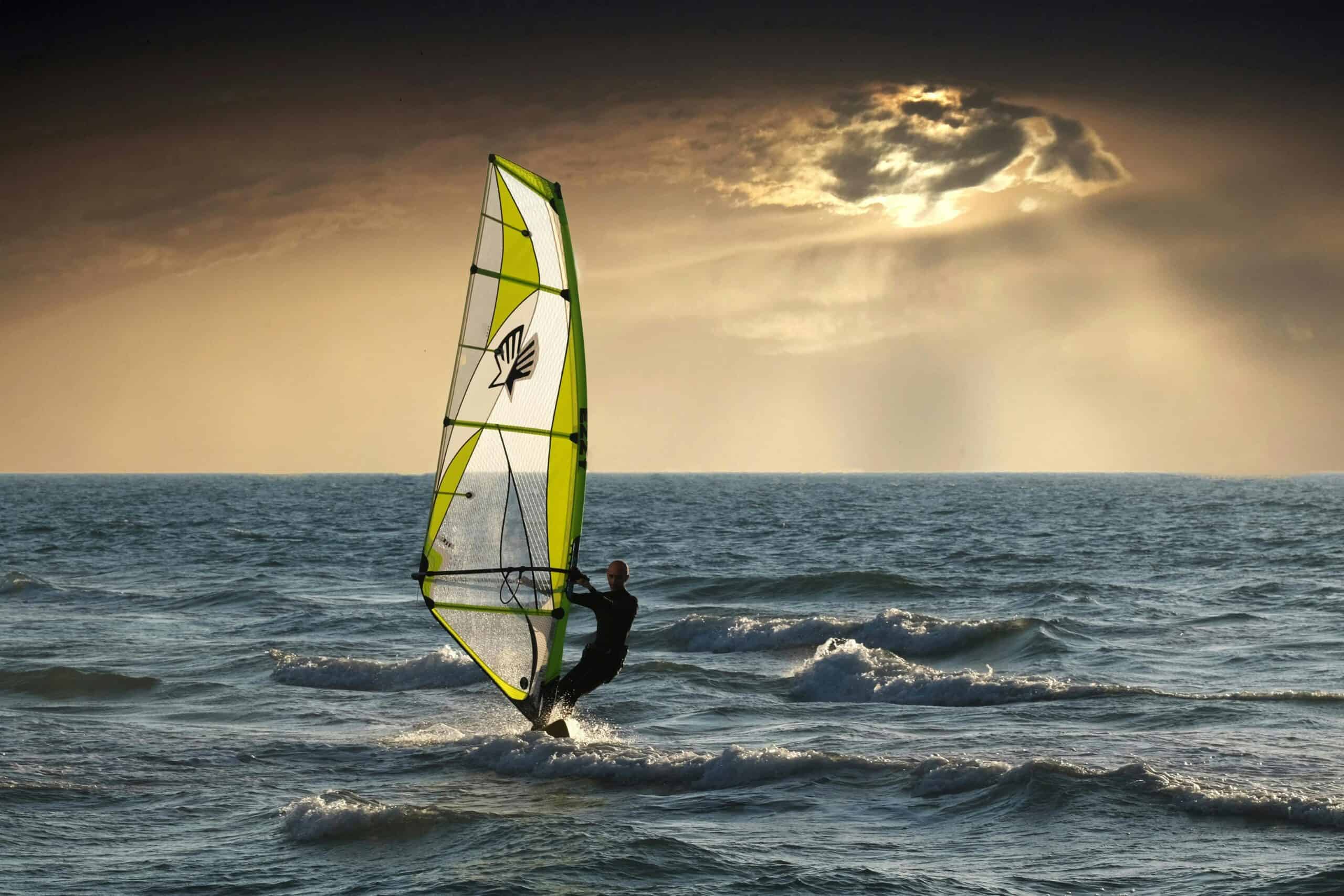 What Is Windsurfing and How Does It Compare to Surfing and Kiteboarding?